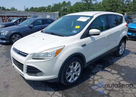 2013 Ford Escape Sel z USA, uszkodzony, nr VIN 1FMCU0HX7DUC59176